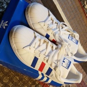 Mens red white and blue superstars.